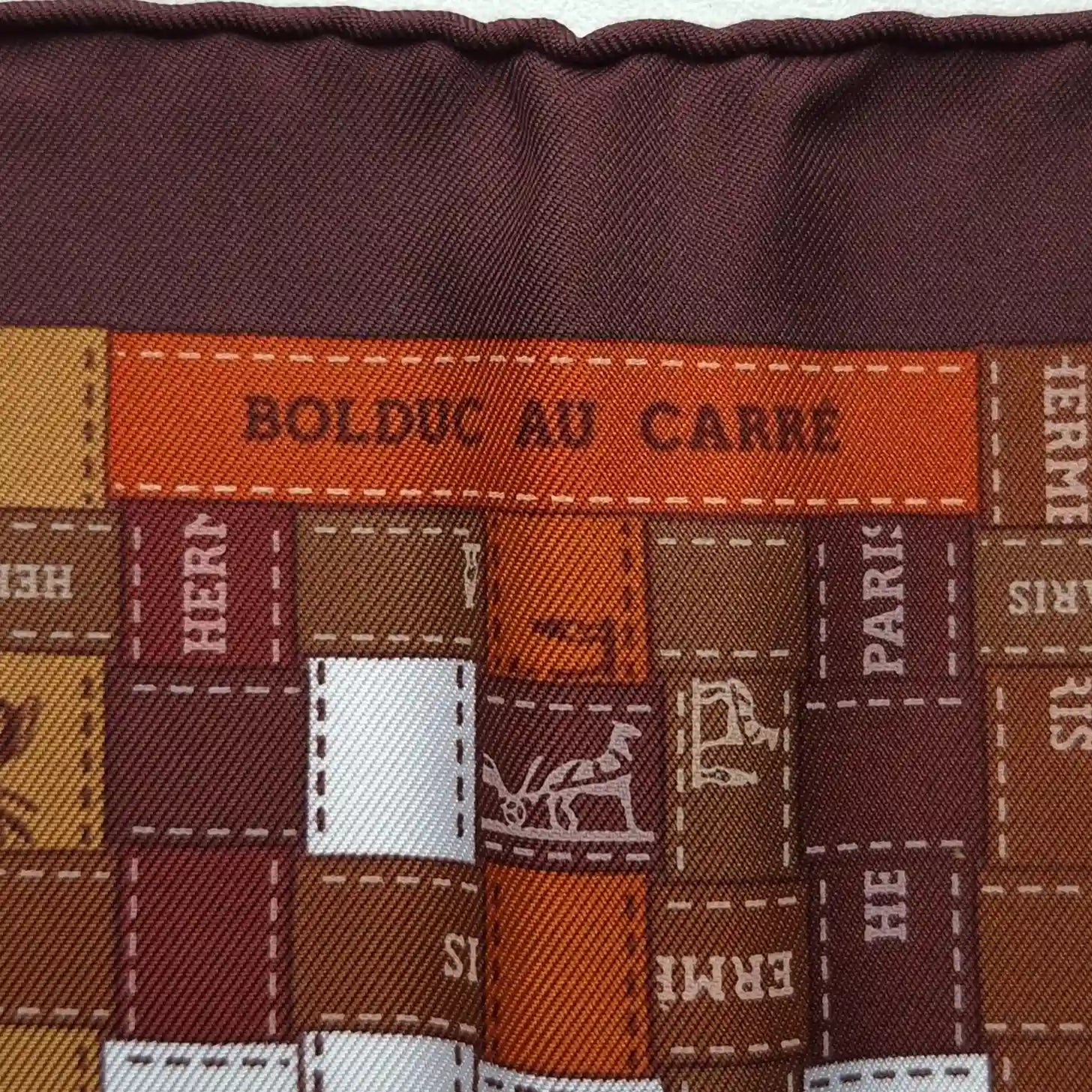 hermes bolduc au carre caty latham silk scarf orange white ribbon pattern detail