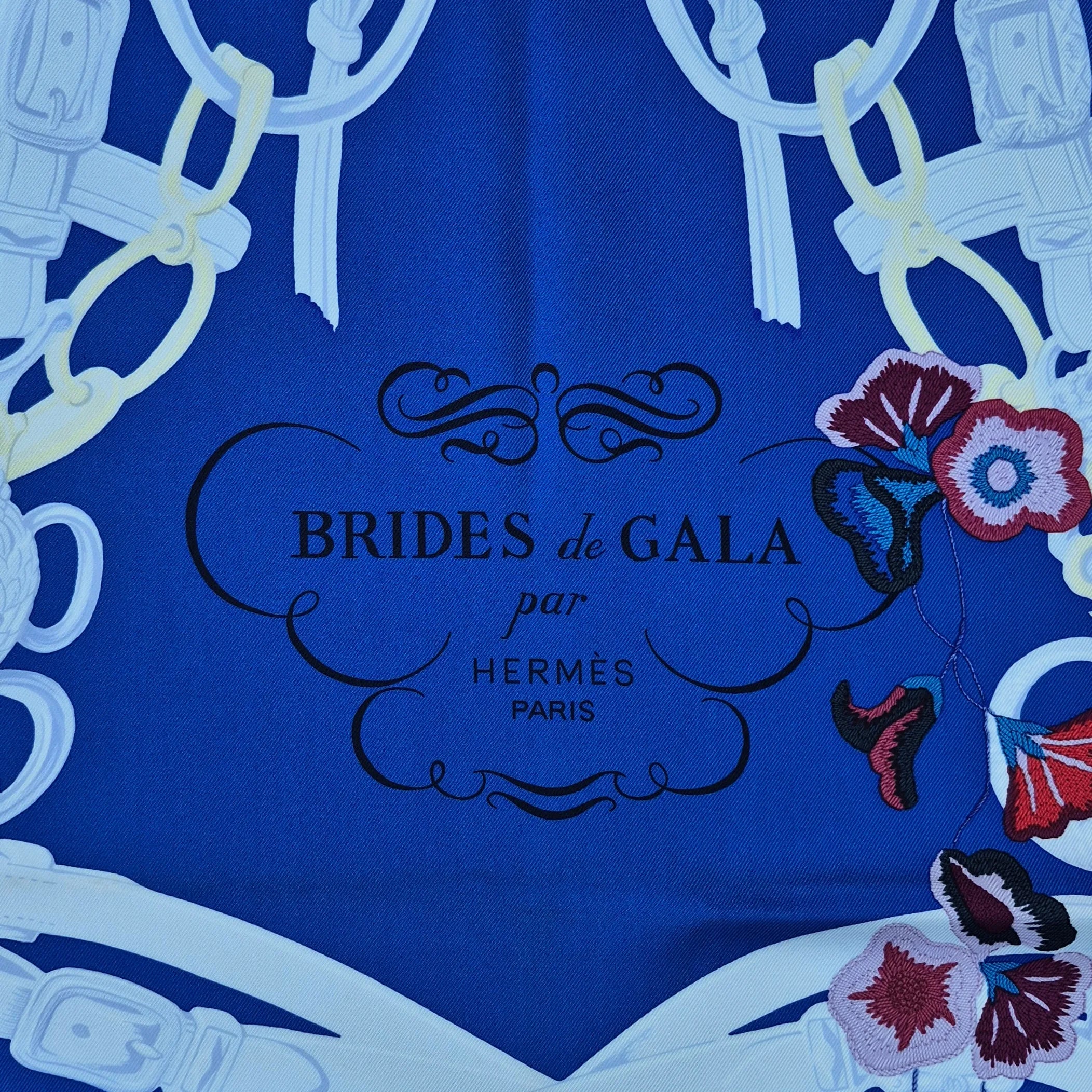 hermes brides de gala hugo grygkar silk scarf blue red floral equestrian bridle