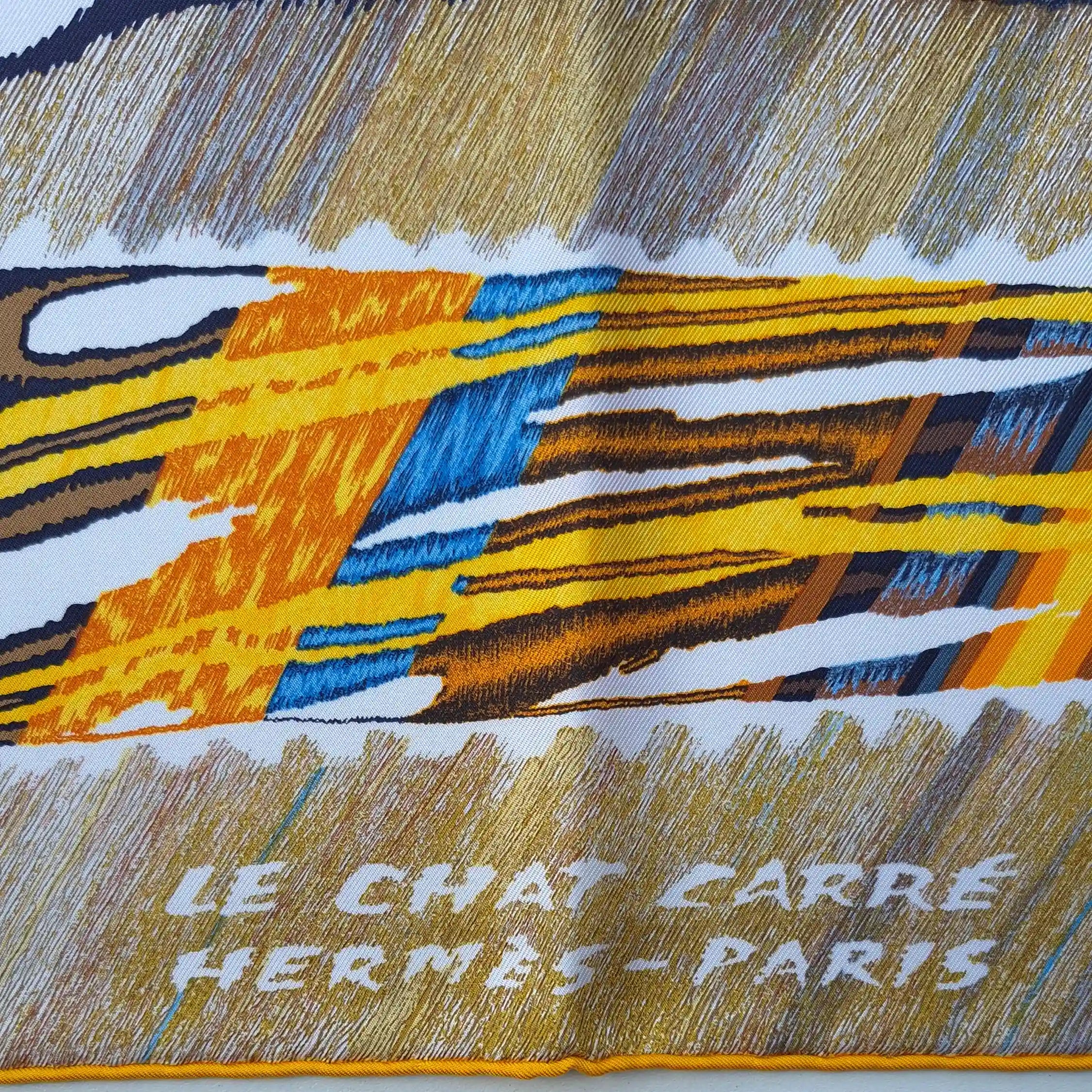hermes le chat carre florence manlik silk scarf yellow brown tiger cat graphic detail