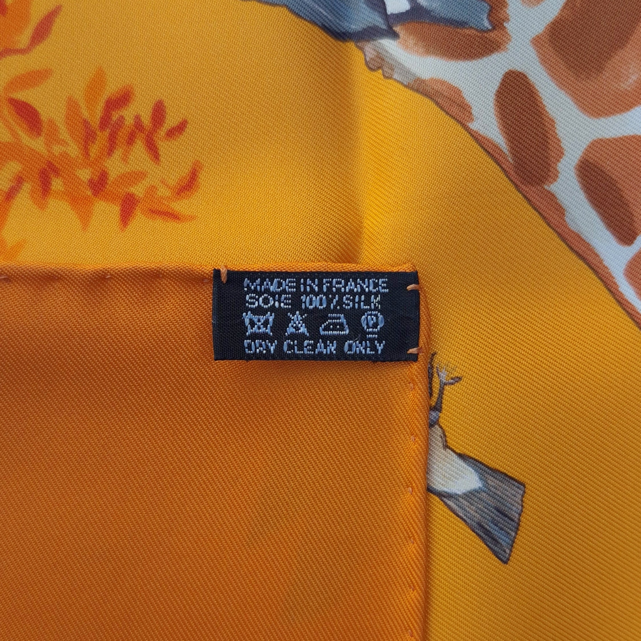 hermes les girafes robert dallet silk scarf orange giraffes savanna detail
