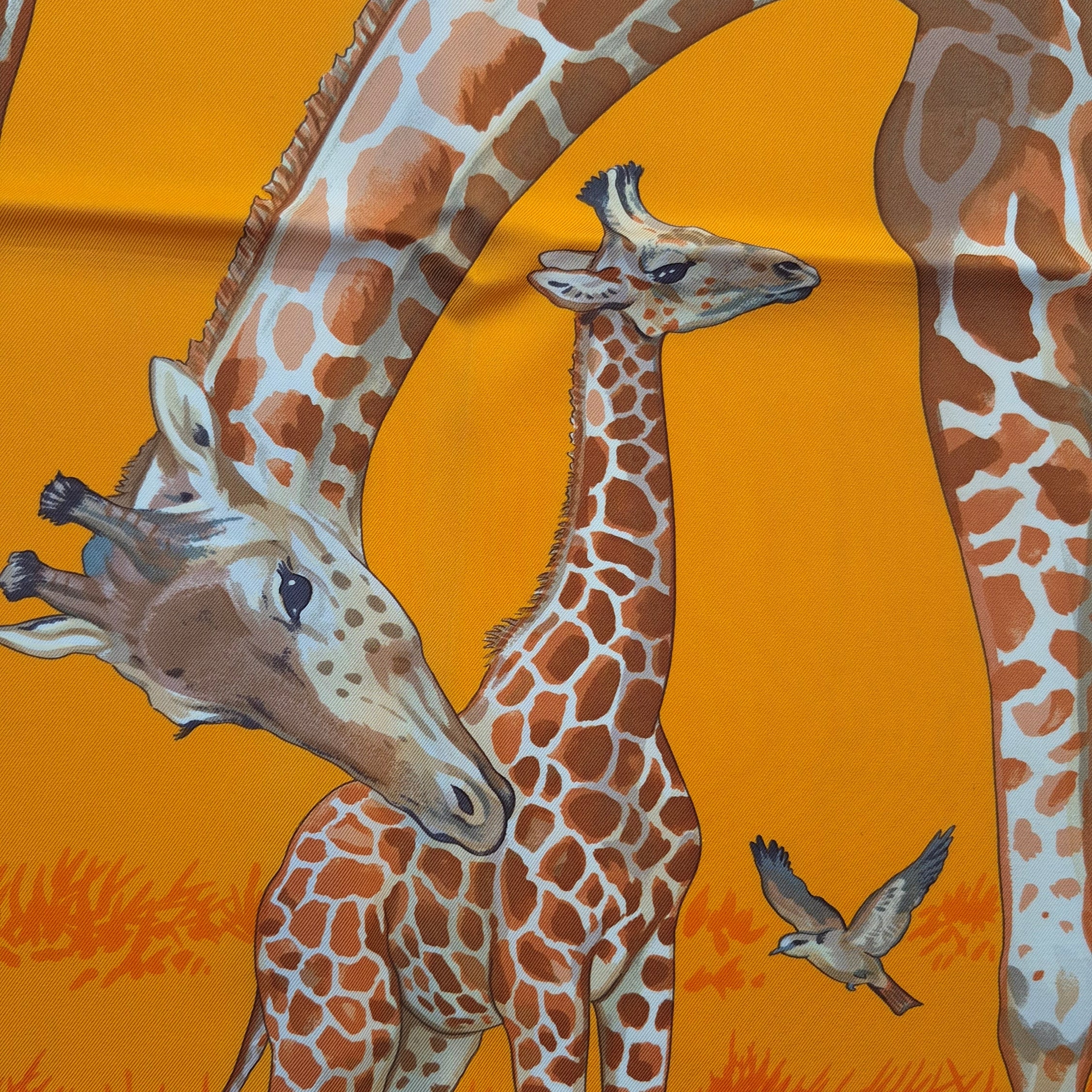 hermes les girafes robert dallet silk scarf orange giraffes savanna detail