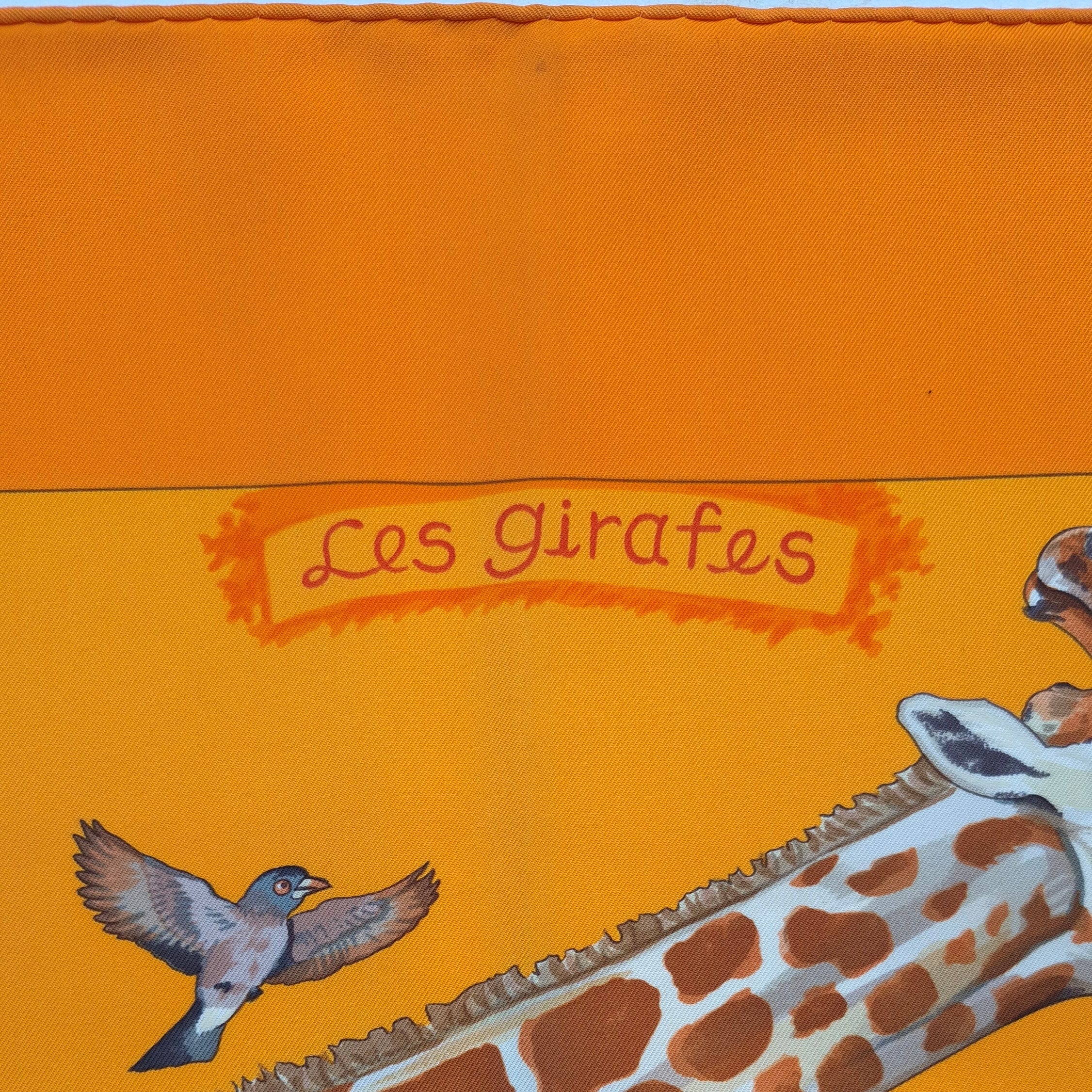 hermes les girafes robert dallet silk scarf orange giraffes savanna detail