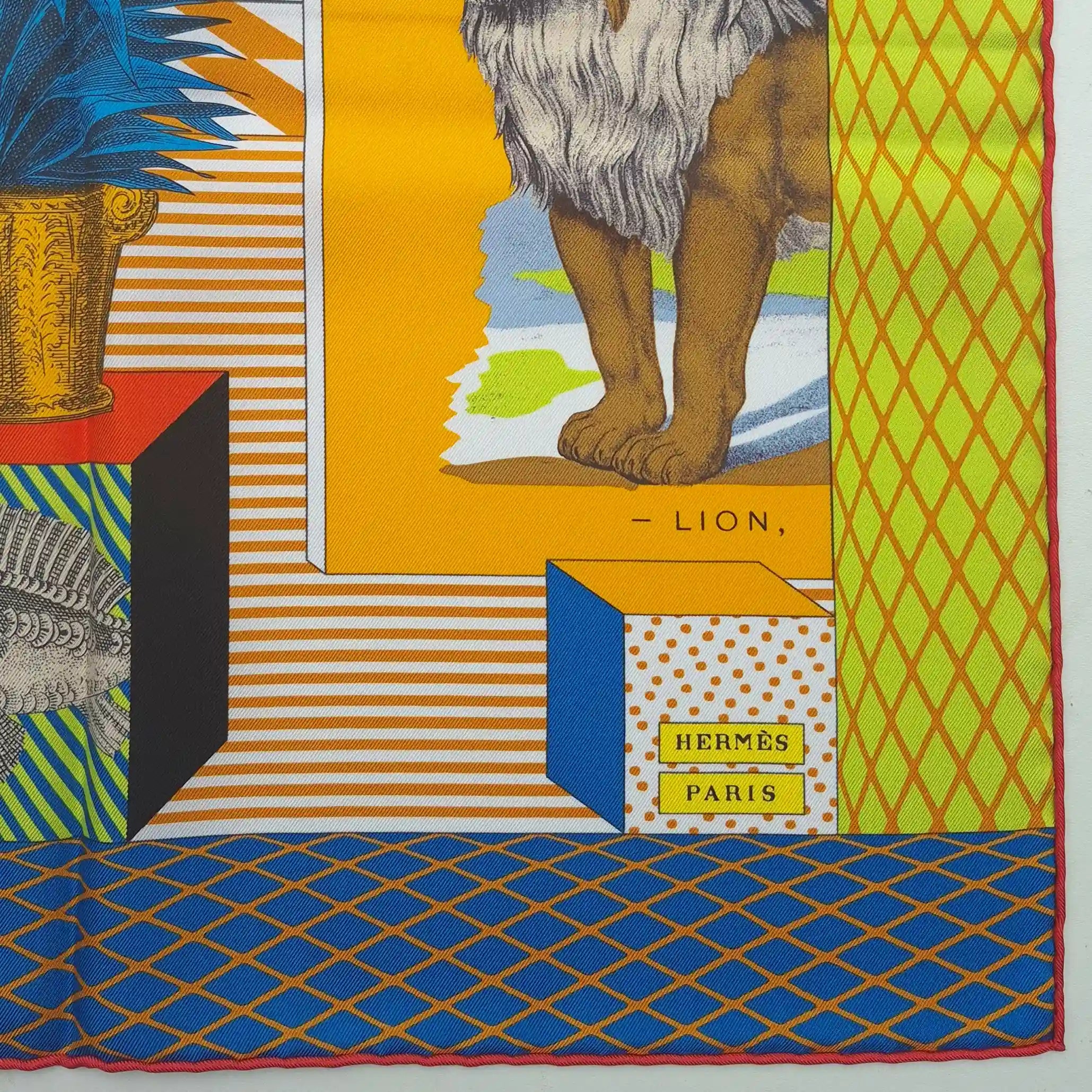 Hermès Grand Théâtre Nouveau silk scarf by Giampolo Pagni 2022 – yellow colorway – baroque scene with exotic animals, ornamental architecture and geometric shapes