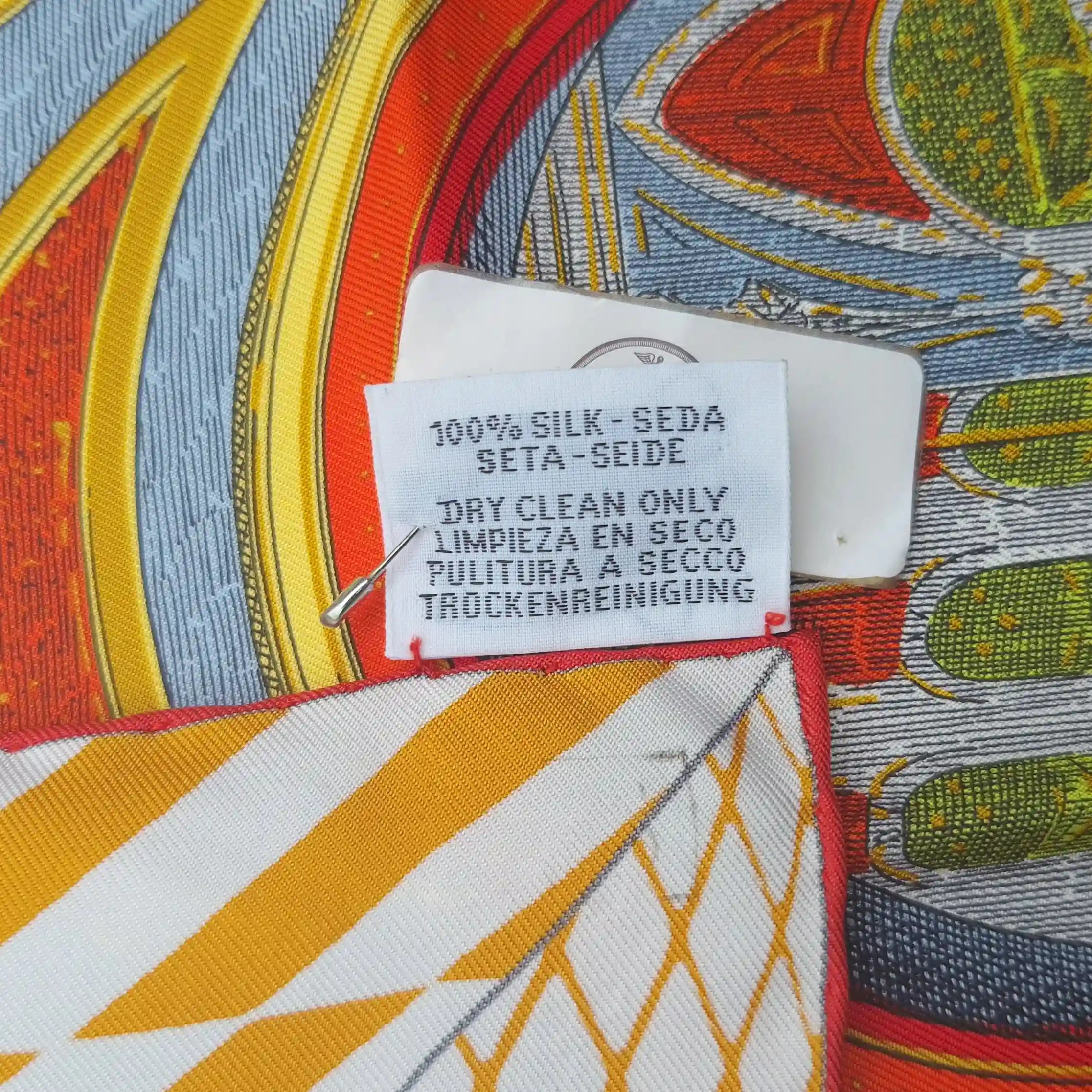 Hermès Grand Théâtre Nouveau silk scarf by Giampolo Pagni 2022 – yellow colorway – baroque scene with exotic animals, ornamental architecture and geometric shapes