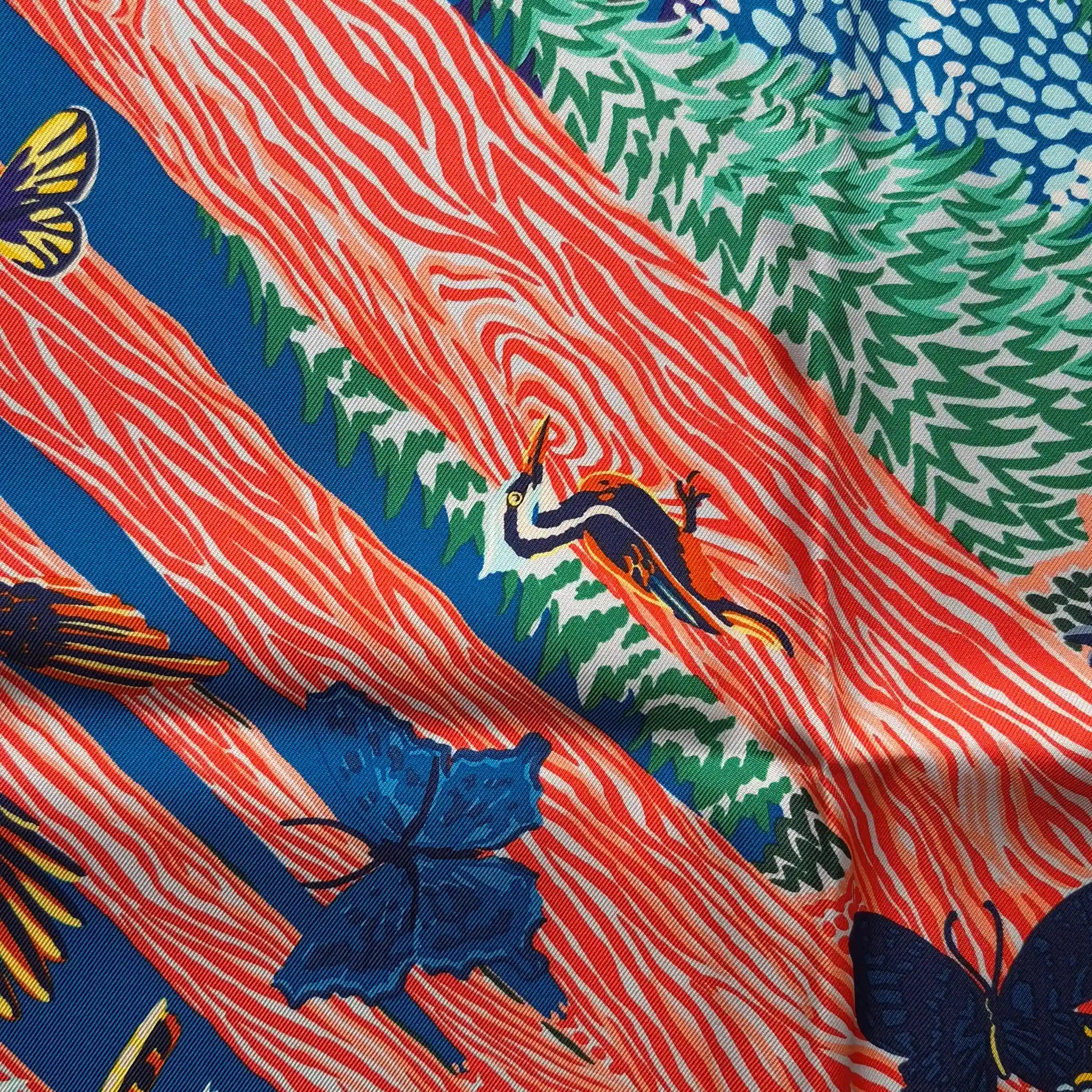 hermes into the canadian wild alice shirley silk scarf red blue canadian wilderness detail