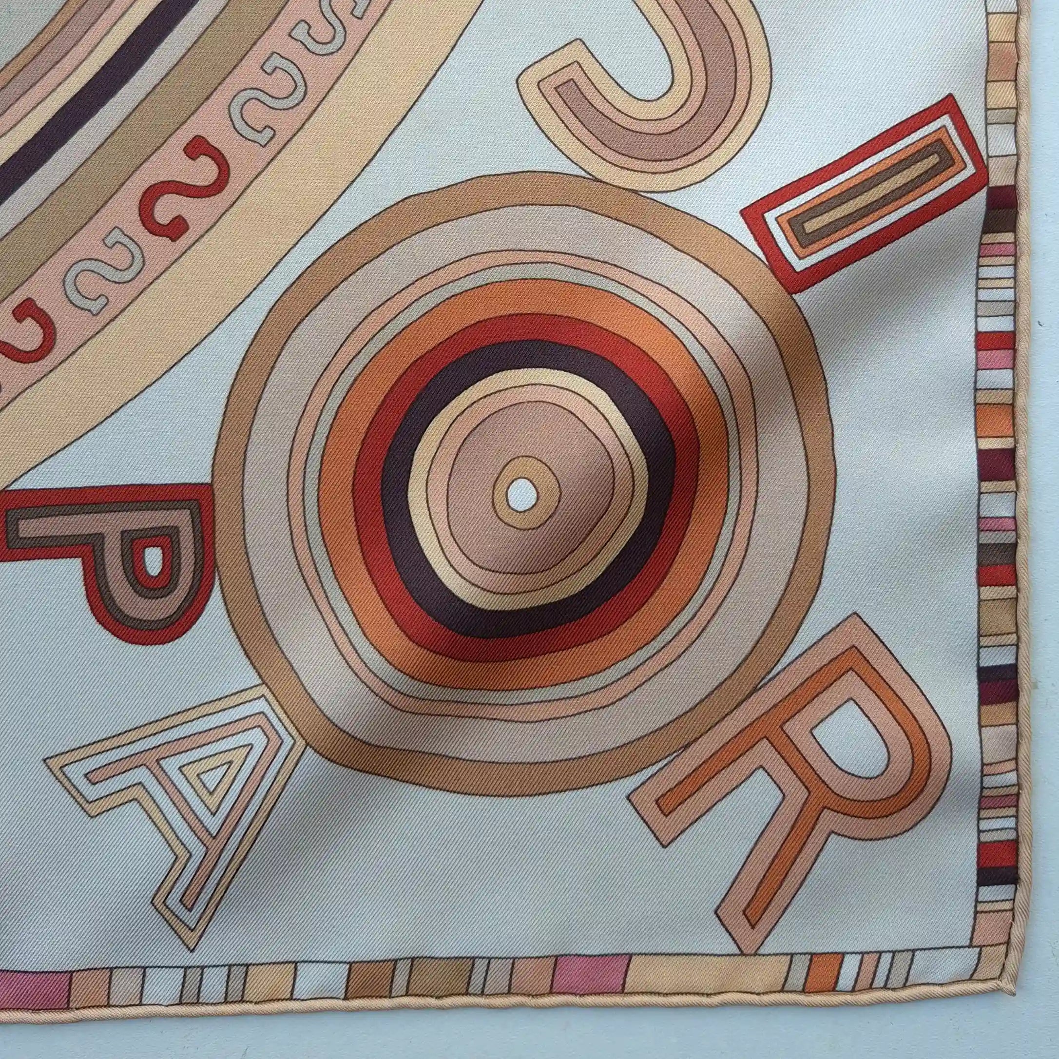 hermes tohu bohu claudia stuhlhofer mayr silk scarf beige red concentric typography detail