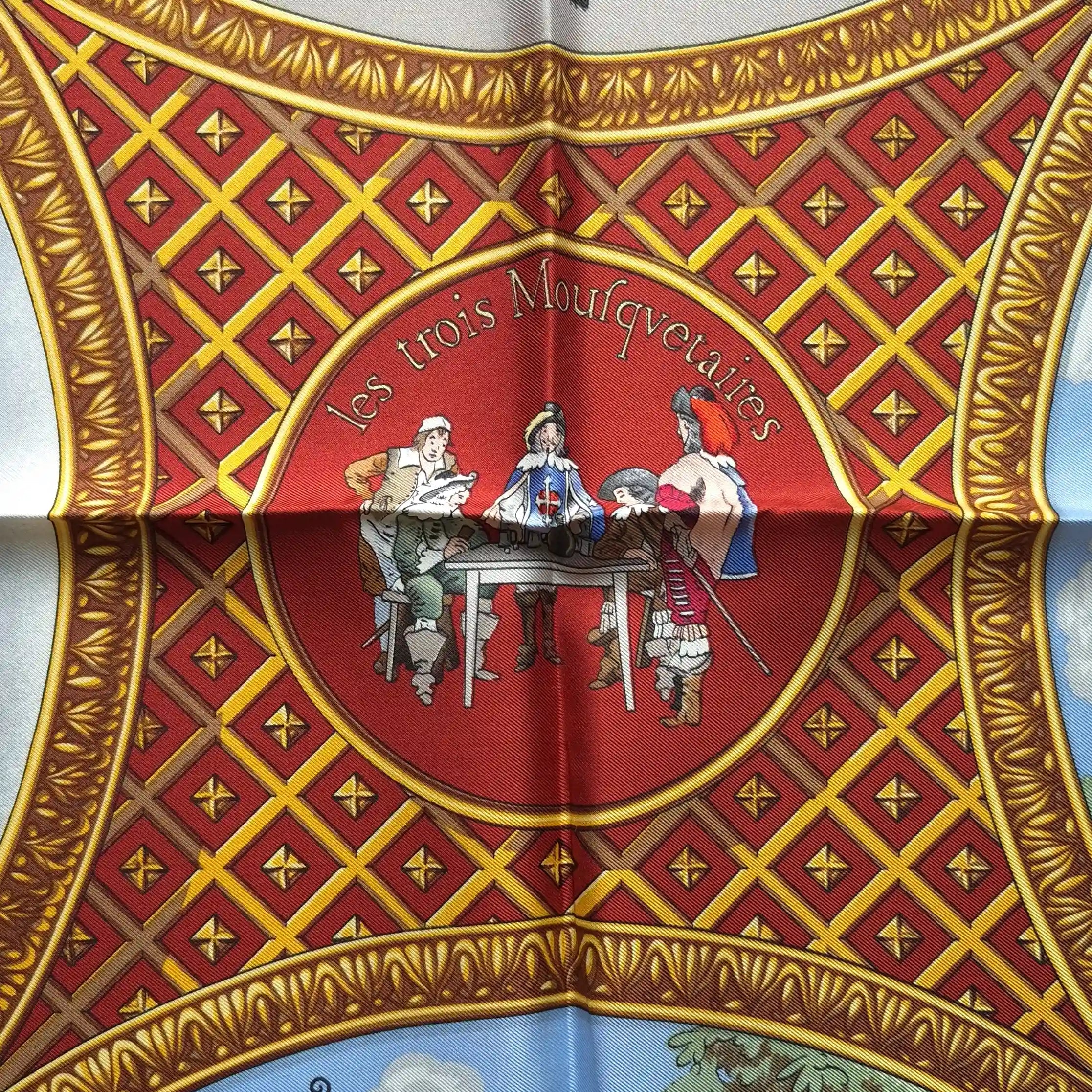 Hermès scarf Les Trois Mousquetaires red silk 90cm Rybaltchenko detail