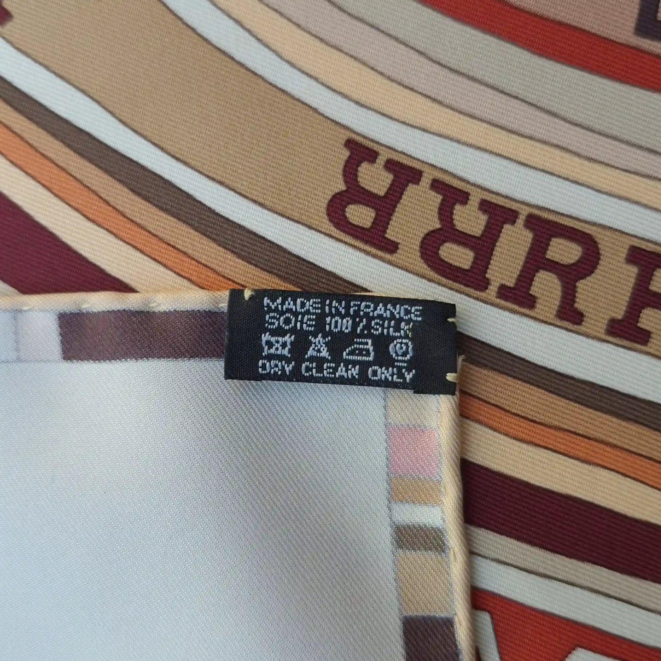 hermes tohu bohu claudia stuhlhofer mayr silk scarf beige red concentric typography detail